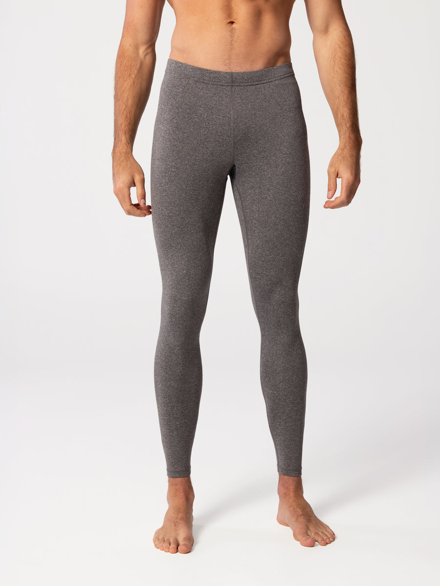 Front view of man wearing Hot Chillys Micro-Elite Chamois granite thermal tights