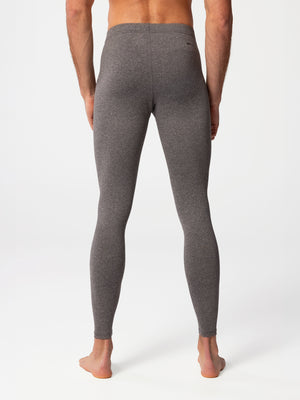 Back view of man wearing Hot Chillys Micro-Elite Chamois granite thermal tights
