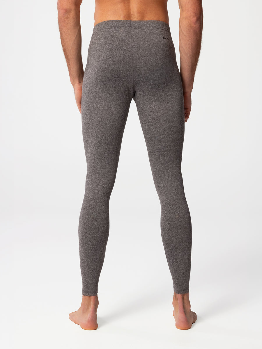 Back view of man wearing Hot Chillys Micro-Elite Chamois granite thermal tights
