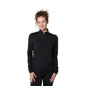 Woman wearing a black long-sleeve athletic top on a white background