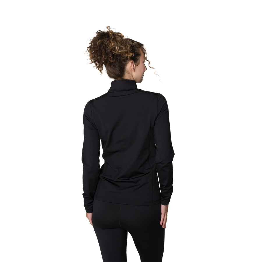 Person wearing a black long-sleeve top on a white background