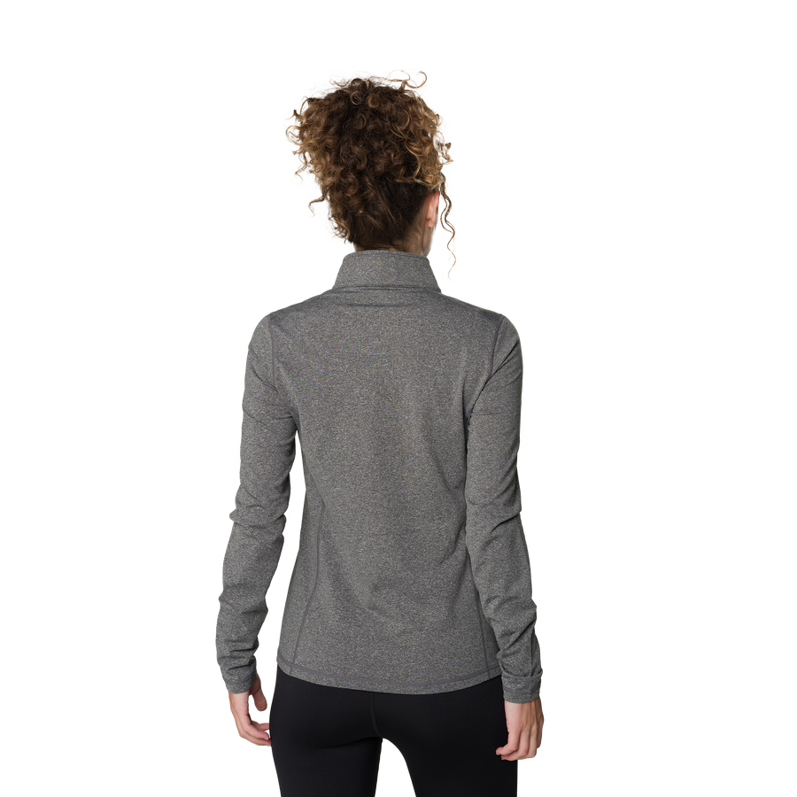 Person wearing a gray jacket on a white background