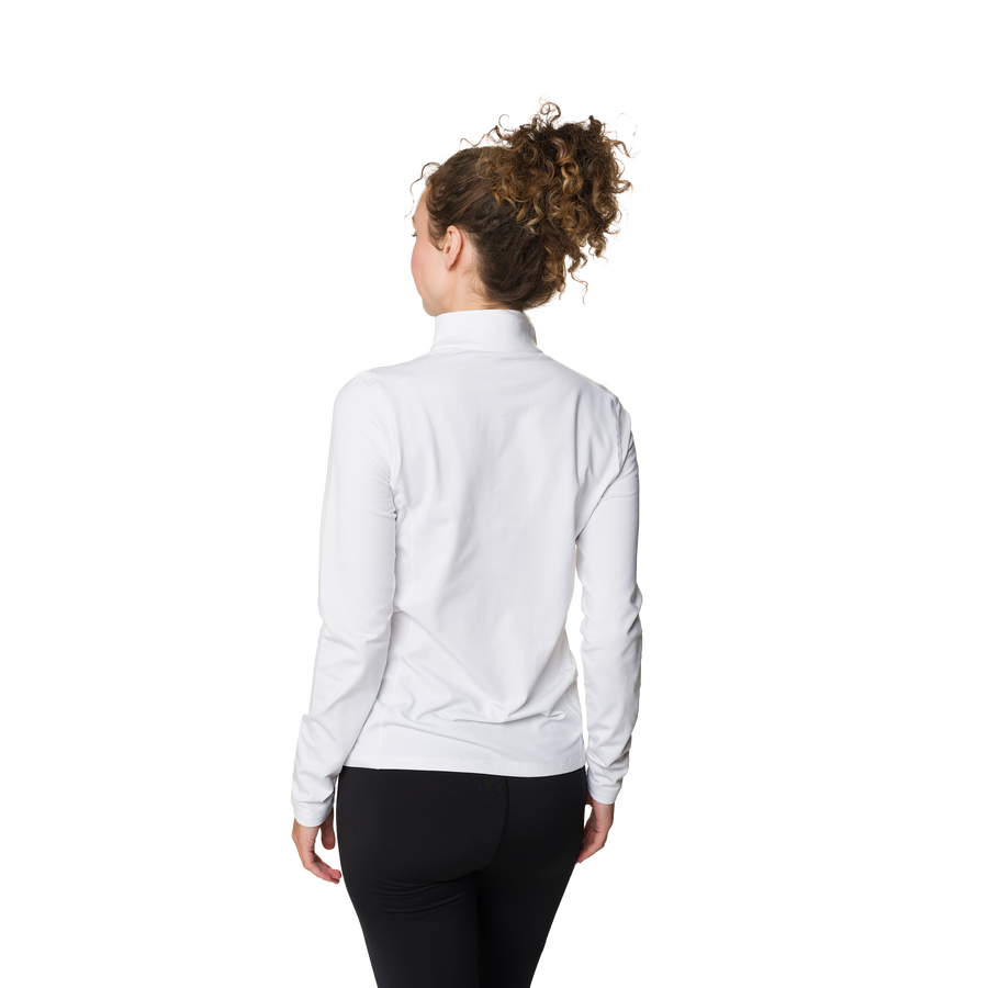 Woman wearing a white long-sleeve shirt on a white background