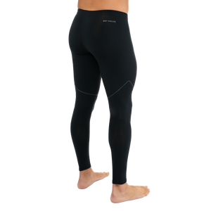 Side view of man wearing Hot Chillys Micro-Elite XT black and grey thermal tights