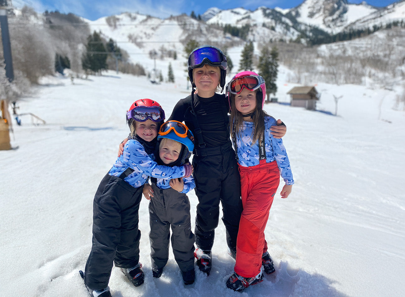 Hot Chillys Youth Originals Base Layers Kids on a ski slope snow on the ground