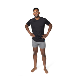 Man wearing Hot Chillys clima-tek moisture wicking tee black short sleeve athletic shirt