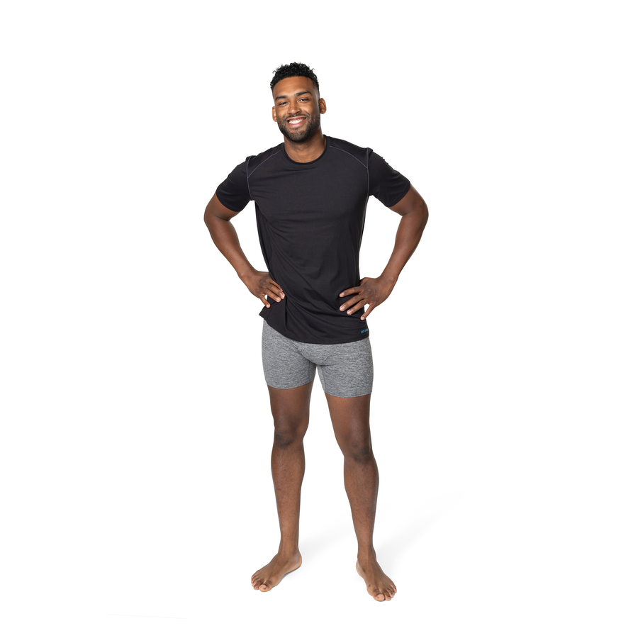 Man wearing Hot Chillys clima-tek moisture wicking tee black short sleeve athletic shirt