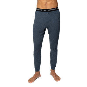 Hot Chillys men's thermal base layer pants in dark gray with elastic waistband for warmth
