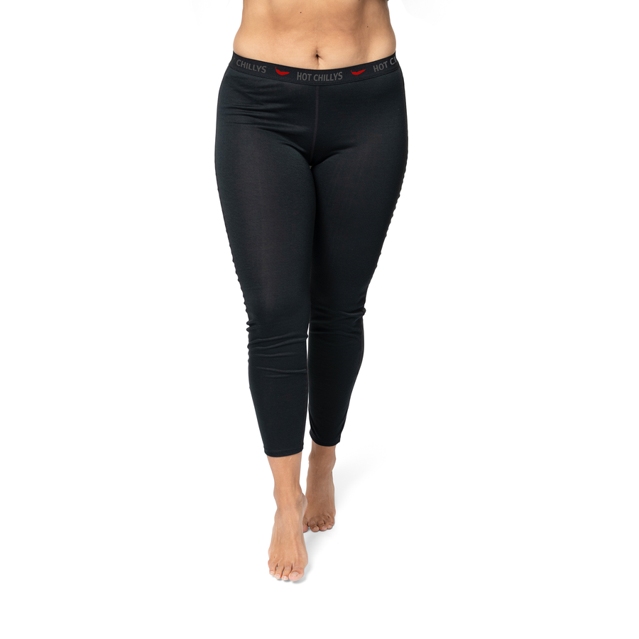 Hot Chillys women's thermal leggings in black with a comfortable waistband for cozy warmth