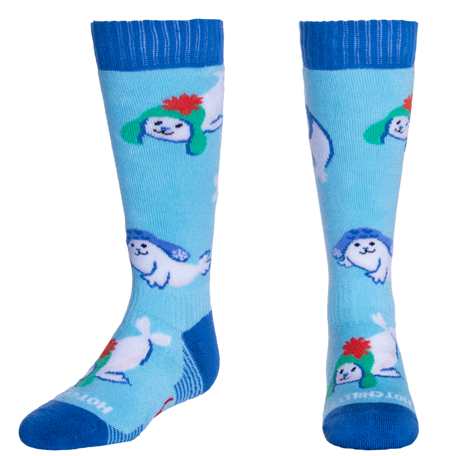 Pair of socks with seal cartoon character design on a light blue background