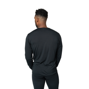 Back view of Hot Chillys men's thermal crewneck top in black, ideal for layering in cold weather