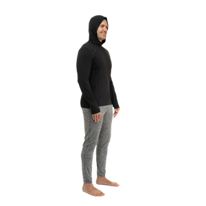 Hot Chillys men's winter thermal hoodie in black worn by smiling man in profile view