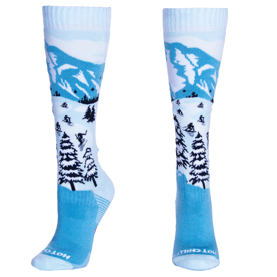 Hot Chillys mid volume cold weather socks with mountain and skier design in blue and white