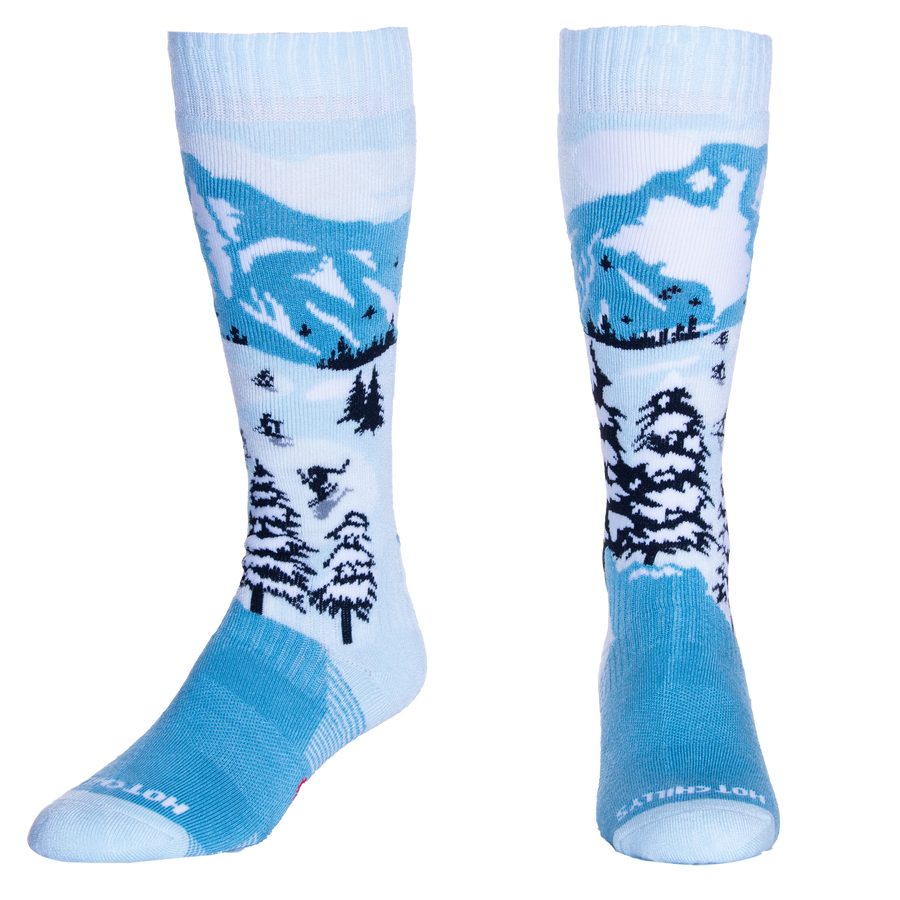 Hot Chillys mid volume cold weather socks with mountain and winter forest design in blue and white
